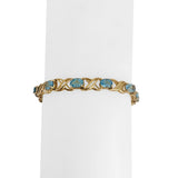 14k Yellow Gold and Blue Topaz 9.7g Ladies X Link Bracelet 7.25 Inches
