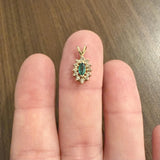 14k Yellow Gold Emerald and Diamond Halo Pendant