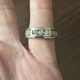 14k White Gold and 0.50cttw Three Diamond Band Ring Size 8.5