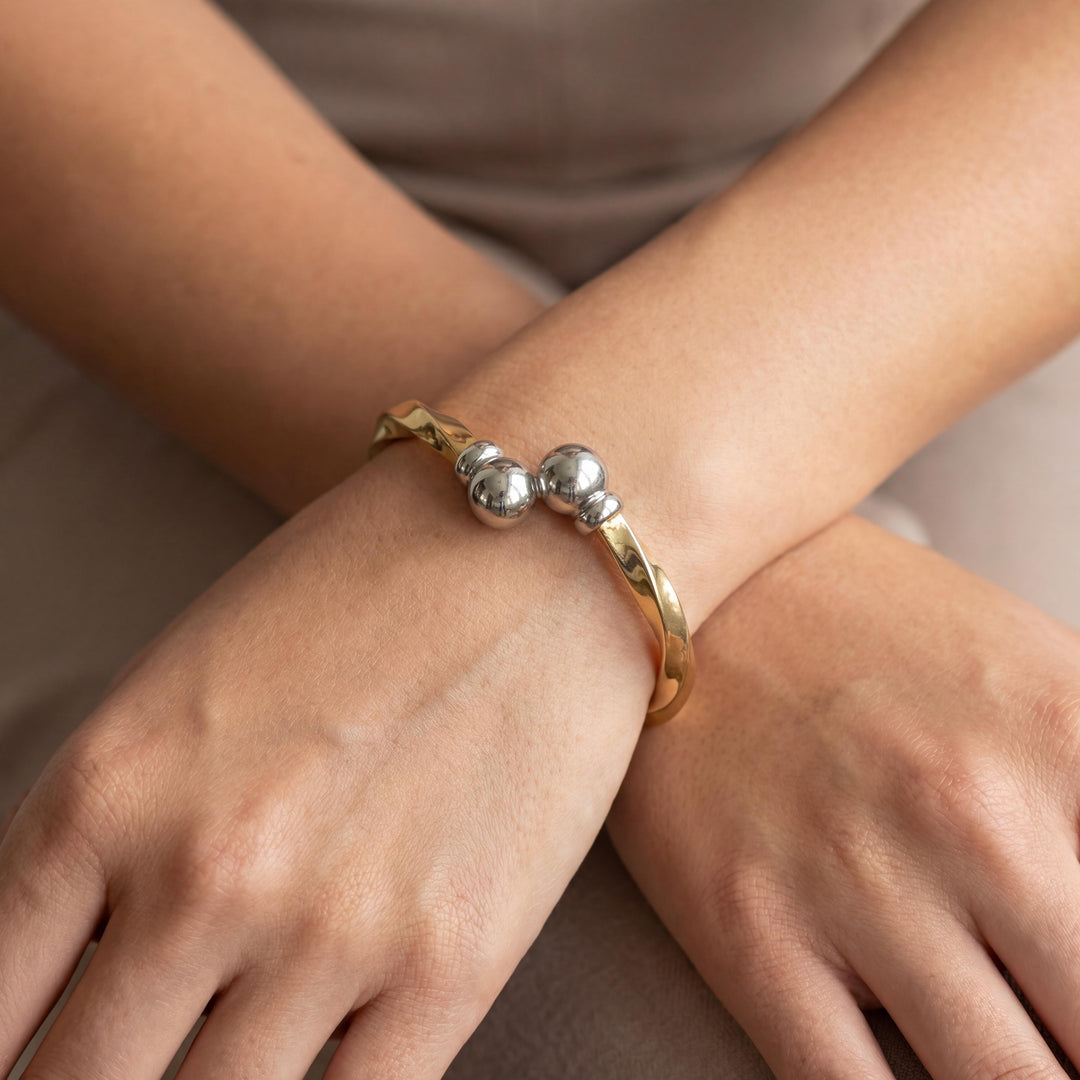 14k Yellow and White Gold 17.8g Two Tone Hinged Bypass Bangle 6.75"