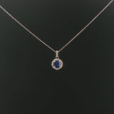 18k White Gold 0.97ct Sapphire and 0.30cttw Diamond Halo Pendant Necklace 16"