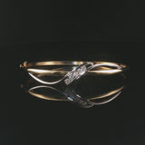 14k Yellow and White Gold 0.50cttw Diamond Fancy Bangle Bracelet 6.75"