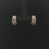 14k Yellow and White Gold 0.18cttw Flush Set Diamond Huggie Earrings