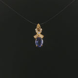 18k Yellow Gold 1.22ct Tanzanite and Diamond Bow Pendant 0.75"
