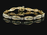 14k Yellow Gold and 2.5cttw Baguette and Round Diamond Bracelet 7.25"