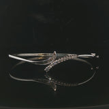 14k Yellow Gold and 0.50cttw Diamond Bypass Bangle Bracelet 7"