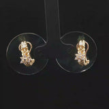18k Yellow Gold and 0.30cttw Diamond Dangle Floral Huggie Earrings