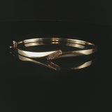 14k Yellow Gold and 0.20cttw Diamond 15.2g Bypass Bangle Bracelet 7"