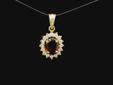 18k Yellow Gold Red Garnet and 0.50cttw Diamond Halo Pendant